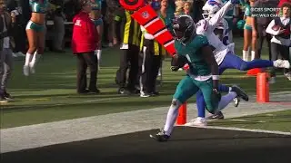 Lawrence tosses it up to Etienne for a TD