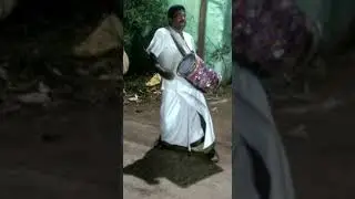 Playing Veeranam instrument with two experts