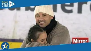 Dancing on Ice's Ryan Thomas cuddles his skating partner as they practice steamy routine