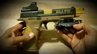 S&W M&P 9mm 1.0 with mods on a budget
