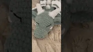 Pattern is called Sleeping Baby Dragon by Red Mill&rsquo;s Crochet.