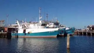 Fishing boat leaves Fishing Boat Harbour, Fremantle.