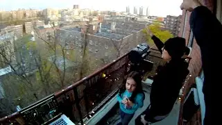 Neighbor hosts weekly dance parties on balcony in Washington Heights