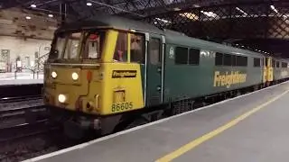 Freightliner 86s 86605 and 639 departing from Carlisle with a container train