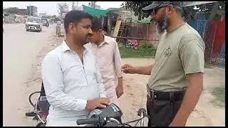 special campaign regarding E Challan of  without Helmet M/Cyclist, PHP Post Quid Azam Colony