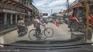 Dinhata, Traffic delineators being destroyed by town municipality operated JCB. Dinhata chowpathi.