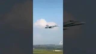 F-18 fighter jet giving a wing wave to the spotters!