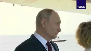The moment Putin reminded his talkative host not to speak during the Russian National Anthem