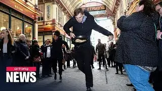 Competitors join pancake race in London to mark Shrove Tuesday