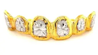 Gold Sunburst Cut Grillz & Jewelry by Seattle Gold Grills