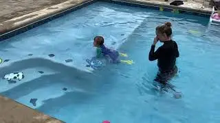 Baby Cooper during infant aquatics class