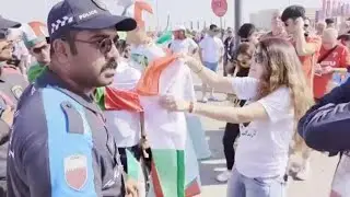 Qatari Police Confront Female Fan Wearing 'Woman, Life, Freedom' T-Shirt at Iran Match