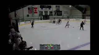 First assist of the Hebron Academy vs Bates Club Emily Finch #15 on green