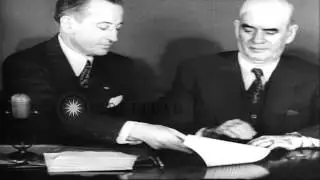 A pact being signed for better labor management relations in post war period in W...HD Stock Footage