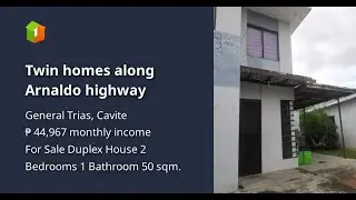 Twin homes along Arnaldo highway