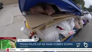 Trash piles up as rain moves in