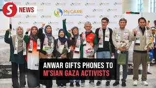 Nine Malaysians freed by Israelis get new phones, courtesy of PM