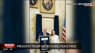 Venezuela’s Machado presents Trump with her Nobel Peace Prize during meeting