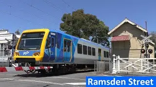 Trains at the Ramsden Street, Clifton Hill level crossing - Metro Trains Melbourne