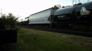 CSX 9022 leads CSX Q679 at the Station in Palmetto, GA