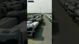 DRONE: aid and fuel trucks lined up at Egypt's Rafah crossing ahead of entry into Gaza