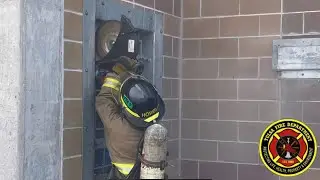 Tulsa Fire Department Academy Class 108 completing a forcible entry Denver Drill.