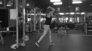 Standing cable overhead tricep extension with rope