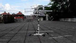 vertical wind turbine auto-flipping wings