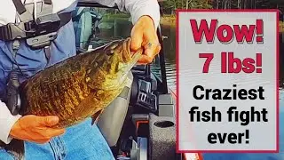 Landing a huge smallmouth bass with a monster line tangle!