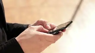 Hands holding smart phone. Stock Footage