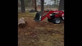 Mahindra #tractor max26 with grapple.