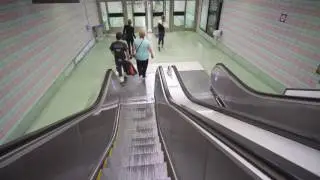 Sweden, Stockholm S&ouml;dra train station, 2X escalator, KONE elevator ride
