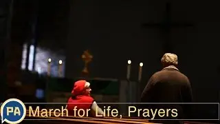 March for Life, supporters pray on the way to Washington D.C.