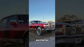 4 door Box Chevy on chrome Rucci wheels