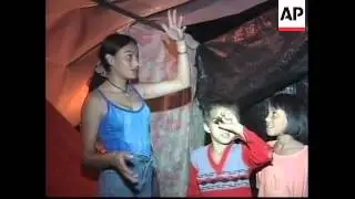 (V) COLUMBIA: COFFINS WAITING BURIAL AS CURFEW CONTINUES