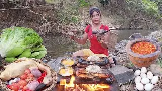 Life in jungle, Big crab grilled on the rock with egg for food, Duck spicy curry Delicious food