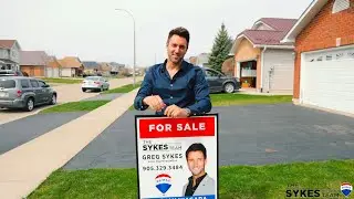Installing a Sykes For Sale Sign