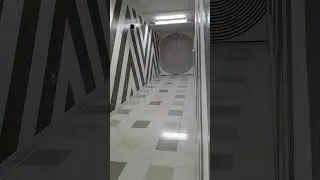 JMKAC Lower Level Ramp Hallway, 2017