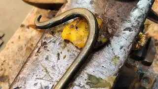 Forge a S hook with no anvil horn. Quick and easy.