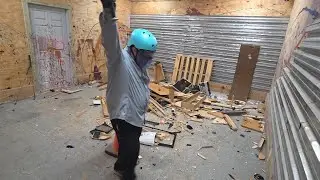 Getting the stress out at a the Rage Room - Smash & Grab Birthday Event.  Alternative Family Fun!