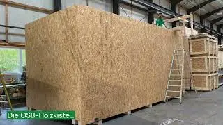 Übergrosse Holzkiste auf Flat Rack nach Übersee