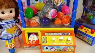 Crane Surprise eggs Kinder Joy toys and Baby doll Pororo play