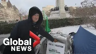 Extinction Rebellion protester sets up camp at Ottawa war memorial