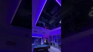 Black mirror glossy stretch ceiling with stars and RGB hidden light