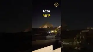 View of The Pyramids at Night from our Guest House!