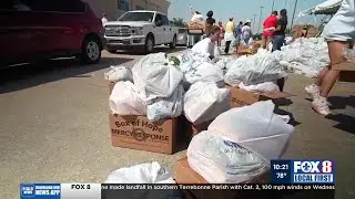 Volunteers load trunks with essentials for Kenner residents recovering from Hurricane Francine