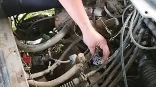 Girls repairs and restores engines of old cars 