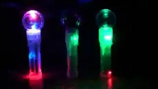 Handheld sensory flashing ball