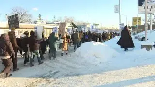 Demonstrators march through Grand Rapids protesting ICE actions