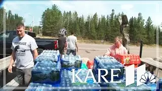 Wildfire expansion slows while more help arrives in northeastern Minnesota